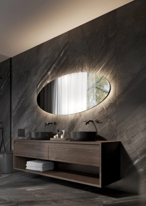 ELIPSE maatwerk spiegel – ovaal design met indirecte LED-verlichting, touchdimmer, spiegelverwarming en Bluetooth-audio. Verkrijgbaar in diverse afmetingen (400×800 mm – 1000×2000 mm) voor een luxe en functioneel interieur.