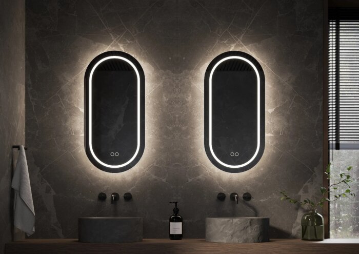Ovale HANNOVER spiegel 450×1000 mm met geïntegreerde LED-verlichting, touchdimmer en spiegelverwarming – modern design, condensvrij en CE-gecertificeerd. Snelle levering en 2 jaar garantie.
