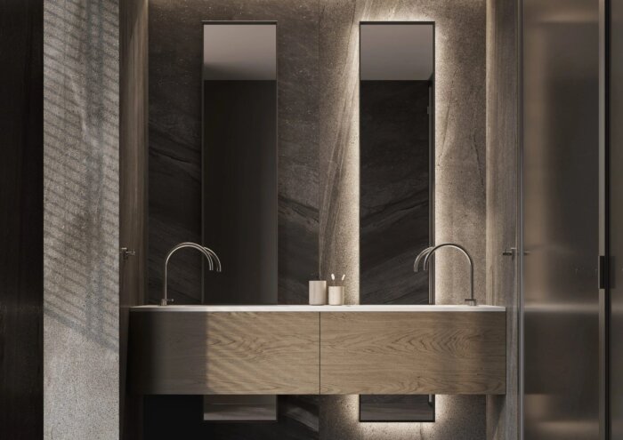 MALTA maatwerkspiegel – luxe tweedelig design met indirecte verlichting, verkrijgbaar in diverse afmetingen en kleuren, inclusief opties zoals dimbare verlichting, Bluetooth-audio en digitale klok. Perfect voor moderne en klassieke interieurs.