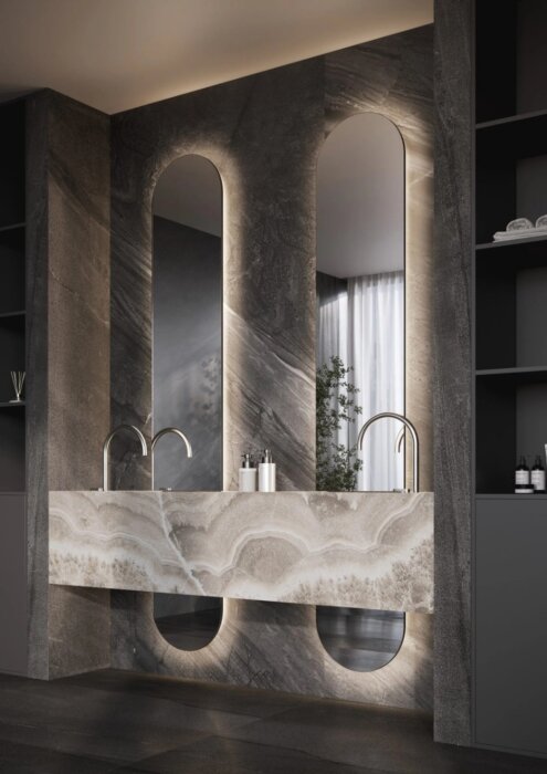 MARBELLA spiegel – luxe tweedelige designspiegel met maatwerkopties, dimbare verlichting, Bluetooth-audio en digitale klok. Ideaal voor badkamer, slaapkamer of hal. Stijlvol, functioneel en op maat verkrijgbaar.