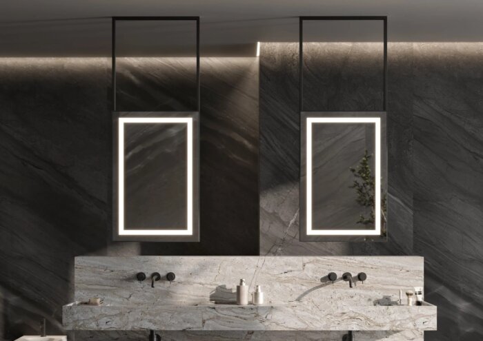 Luxe NICE spiegel met strak frame en subtiele rondingen, verkrijgbaar in maatwerkafmetingen (800×400 mm tot 1400×700 mm). Keuze uit meerdere kleuren, waaronder mat zwart. Indirecte verlichting, dimbare trafo’s, Bluetooth-audio en digitale klokopties. CE-g
