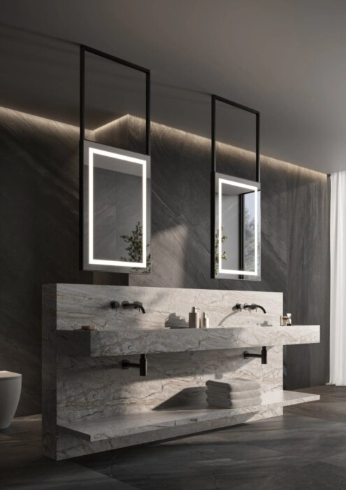 Luxe NICE spiegel met strak frame en subtiele rondingen, verkrijgbaar in maatwerkafmetingen (800×400 mm tot 1400×700 mm). Keuze uit meerdere kleuren, waaronder mat zwart. Indirecte verlichting, dimbare trafo’s, Bluetooth-audio en digitale klokopties. CE-g